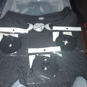 Discontinued BNIP Cat cross ornament from Dolls Kill